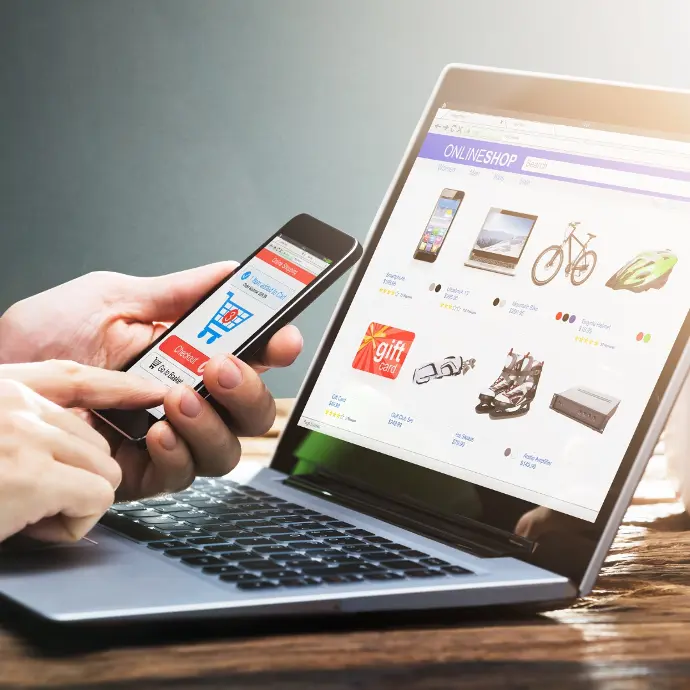 E-commerce website displayed on laptop and on mobile