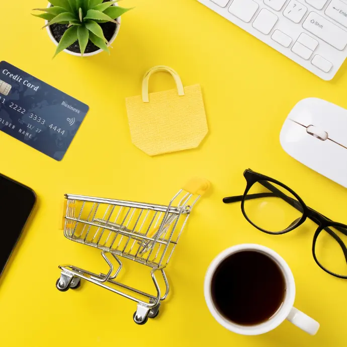 Various e-commerce elements in a yellow background