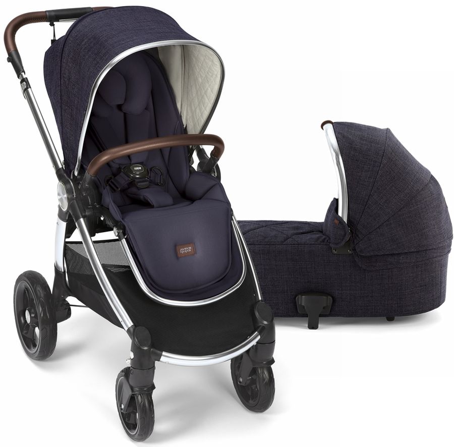Mamas And Papas Navy Stroller With Holding baby travel bad