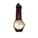 Casio Quartz MTP1183, With a Beautiful dark reddish-brown colored Strip,