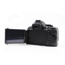 Nikon D5100 with the 18-55mm kit lens and charger (no battery)
