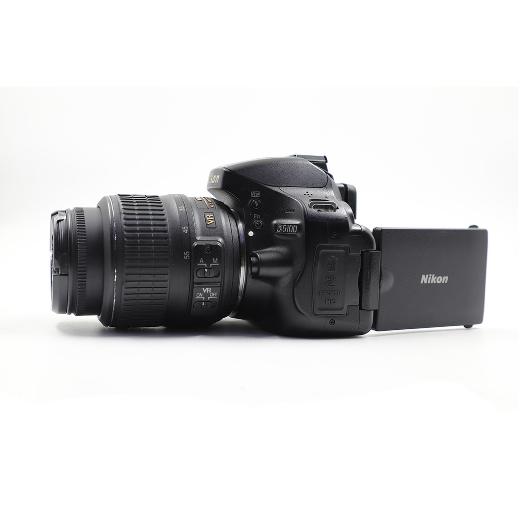 Nikon D5100 with the 18-55mm kit lens and charger (no battery)