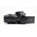 Nikon D5100 with the 18-55mm kit lens and charger (no battery)