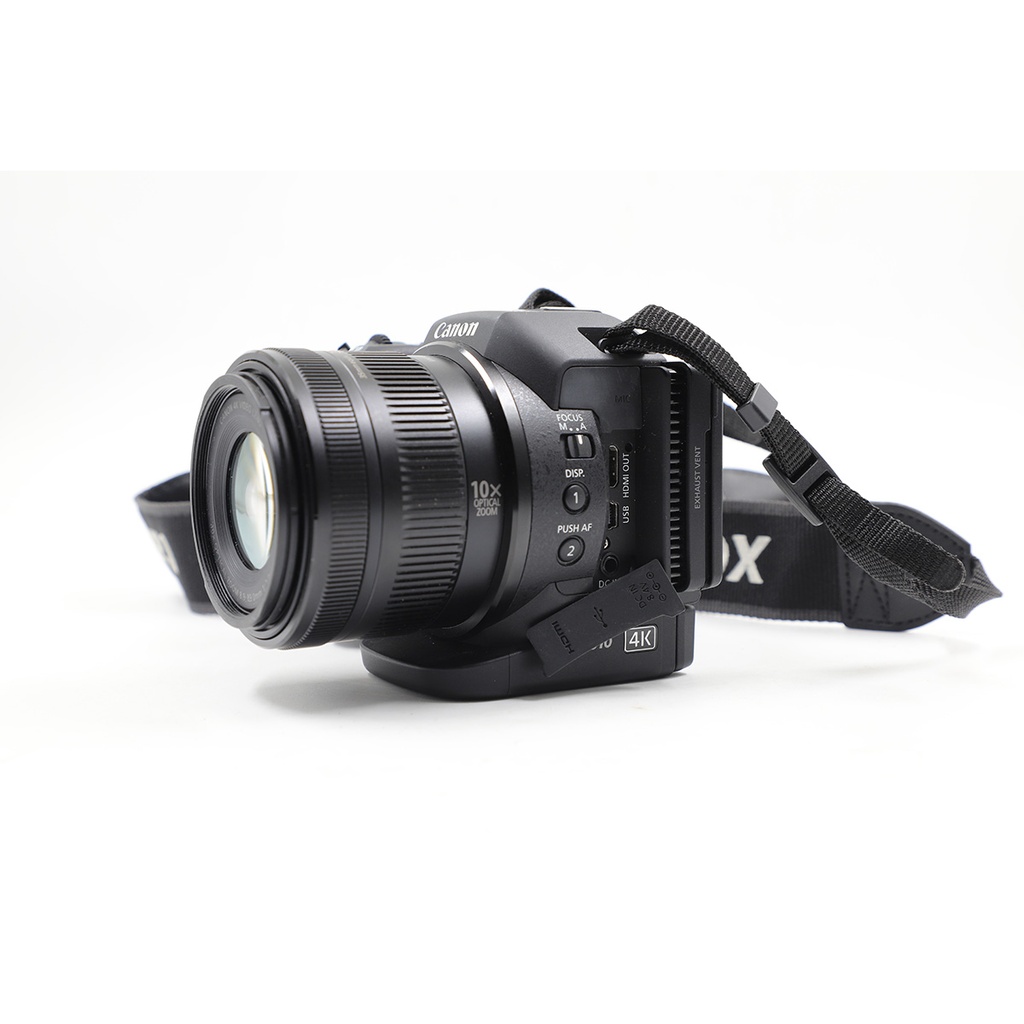 Canon CX 10 4K  Mini Cinema Camera, Includes 4 memory Card+ 2 Flash Light + Charger + Cart Reader + 2  Bags and Couple Of Cables