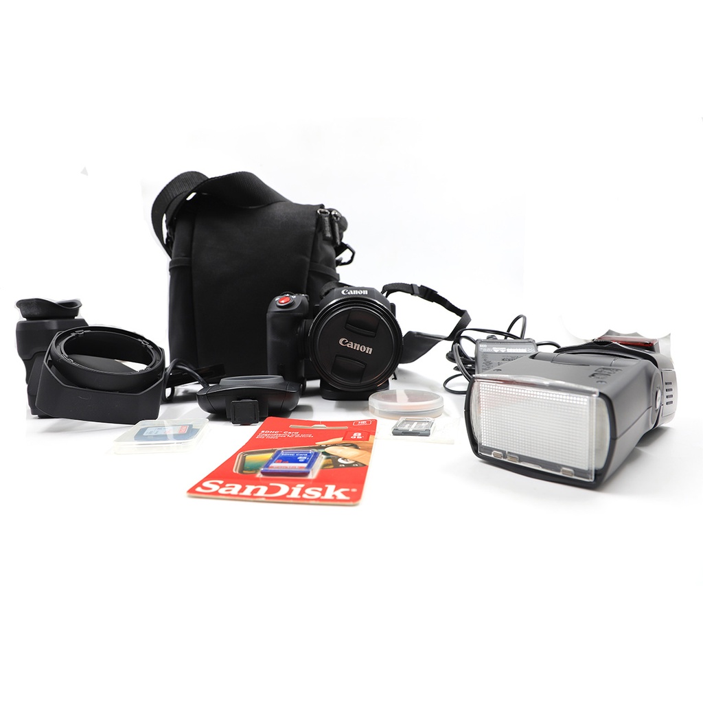 Canon CX 10 4K  Mini Cinema Camera, Includes 4 memory Card+ 2 Flash Light + Charger + Cart Reader + 2  Bags and Couple Of Cables