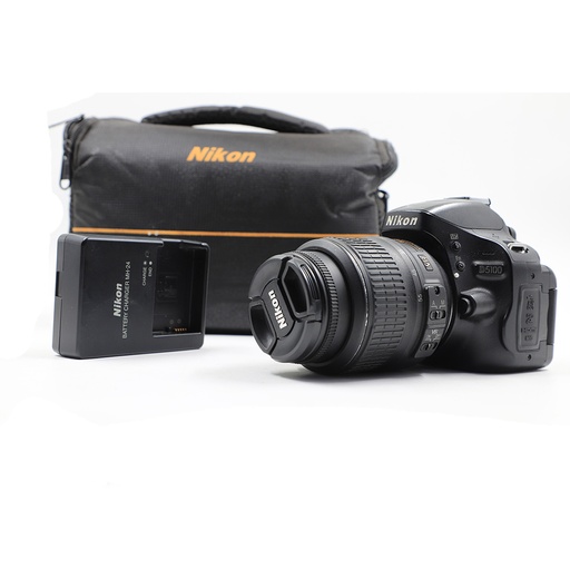 Nikon D5100 with the 18-55mm kit lens and charger (no battery)