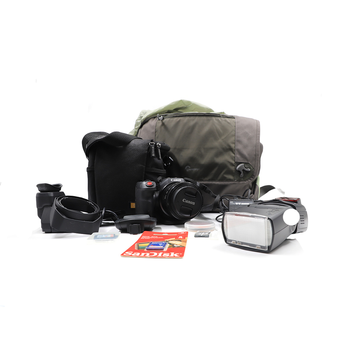 Auction For Canon CX 10 4K Mini Cinema Camera, Includes 4 memory Card+ 2 Flash Light + Charger + Cart Reader + 2  Bags and Couple Of Cables