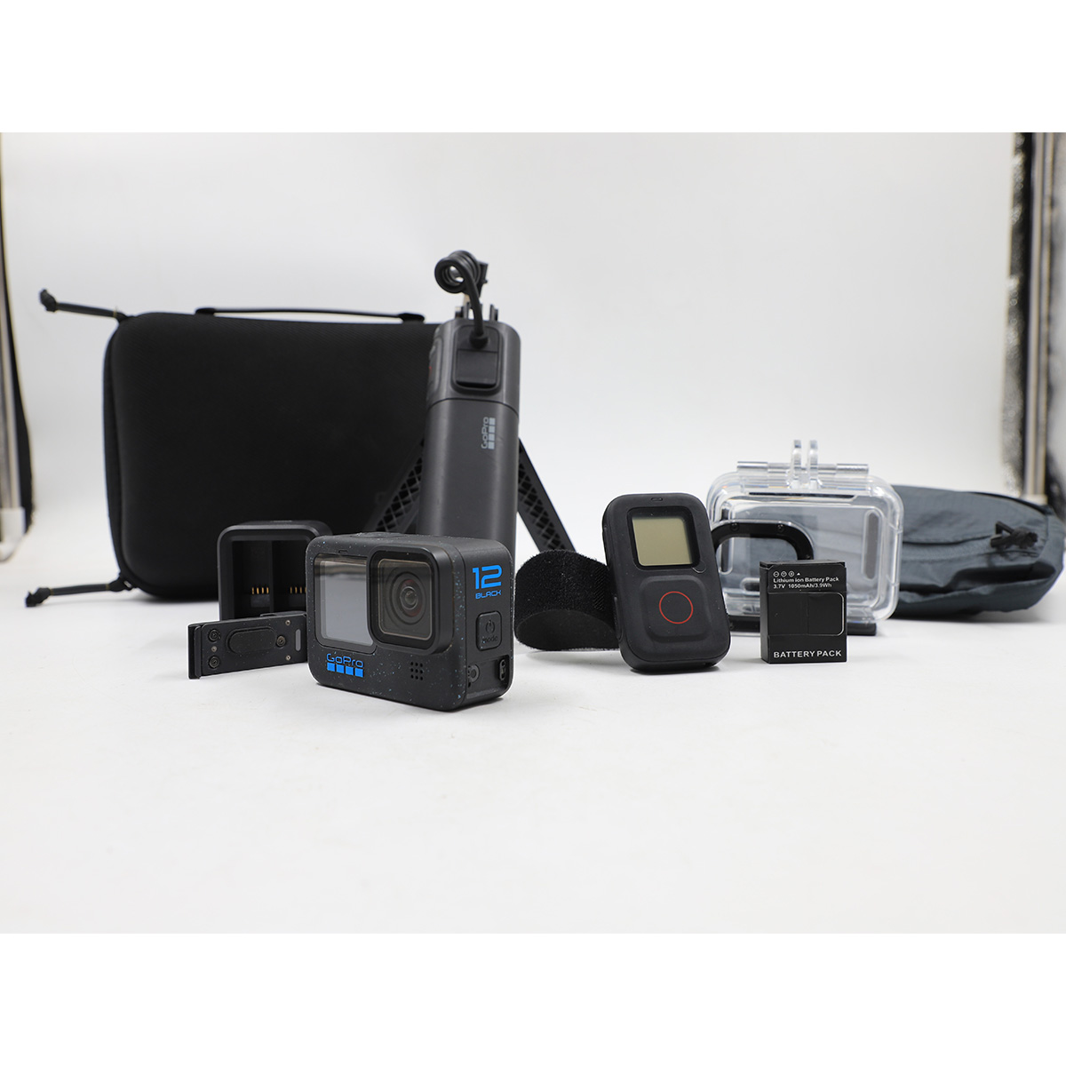 Auction For GoPro 12 Black + Go Pro Strap + 2 Go Pro batteries + Go Pro  Battery Pak Charger + GoPro Wireless Tripod + GoPro Camera Cover + Multiple File And Pouch + Big Black Pouch