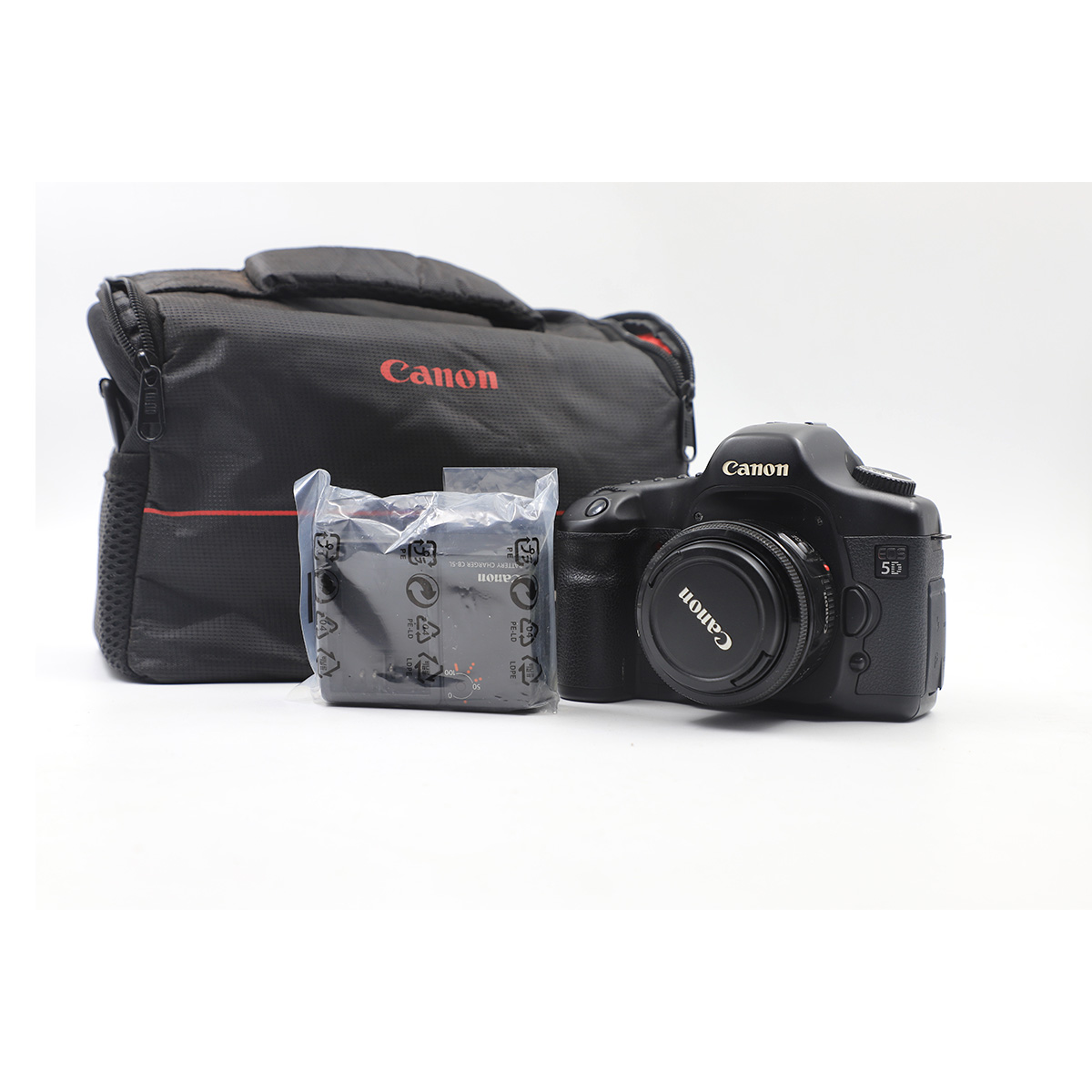 Auction For Canon Eos 5D  DS126091, + Lens  Canon 50 mm+ Pouch And Charger ** Doesn’t Include Battery**
